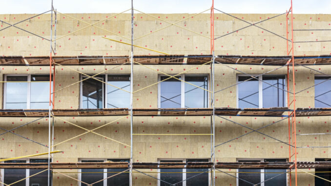 home facade insulation with rock wool. energy efficiency house w